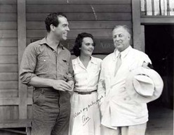 Actor Fred MacMurray, Ann Cottrell (Free) and Hollywood producer Edward H. Griffith on the set of 